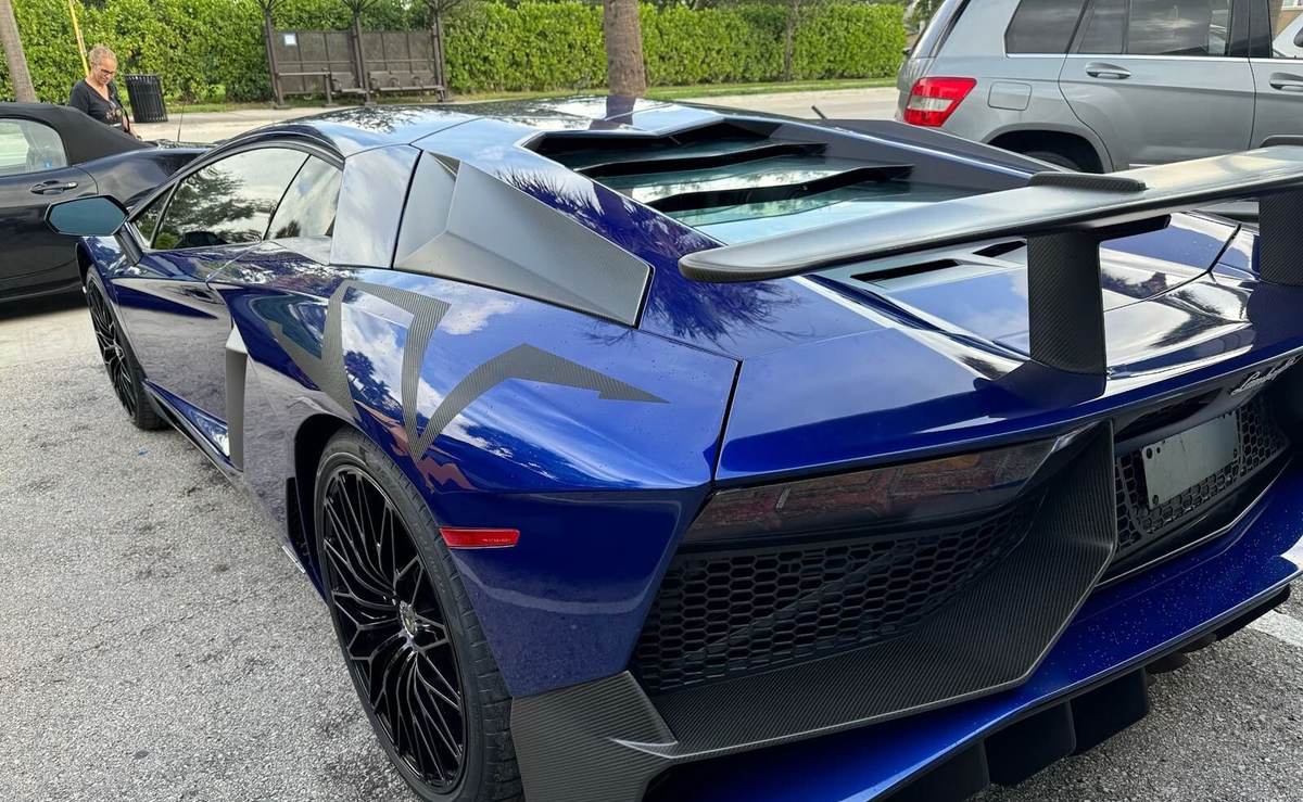 Blue Lamborghini Aventador SV after rear collision repair at Gold Coast Collision Center, Pompano Beach
